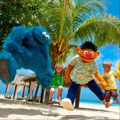 cookie monster, ernie, bert jump with child